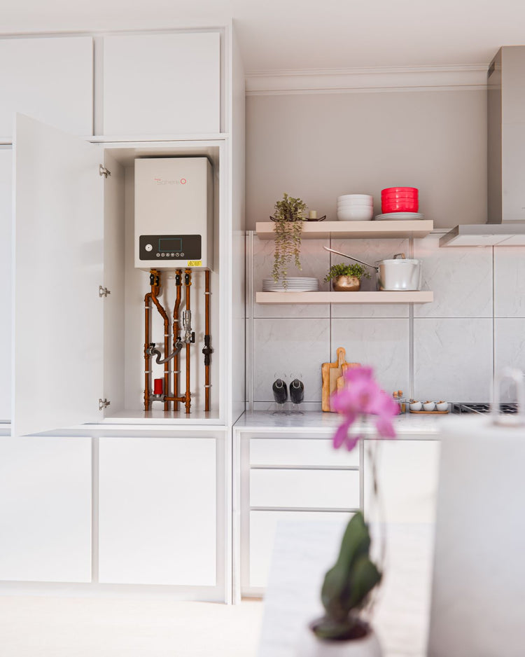 ThermoSphere Electric Combi Boiler in modern kitchen cabinet