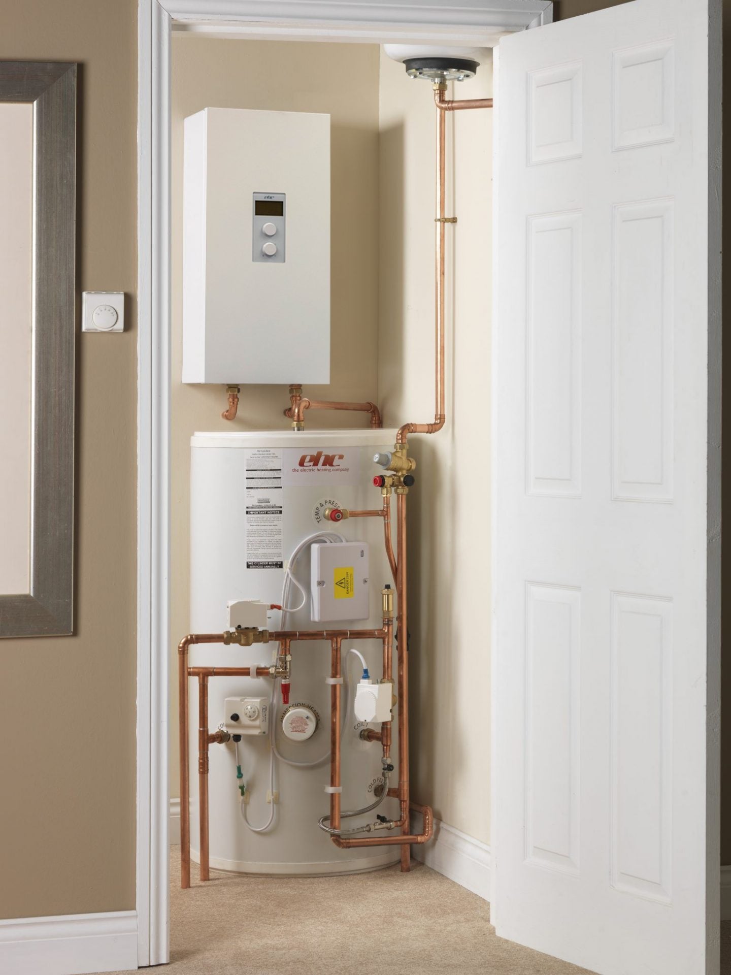 EHC Direct and Indirect Cylinders installation displayed in a home setting, showcasing boiler connections.