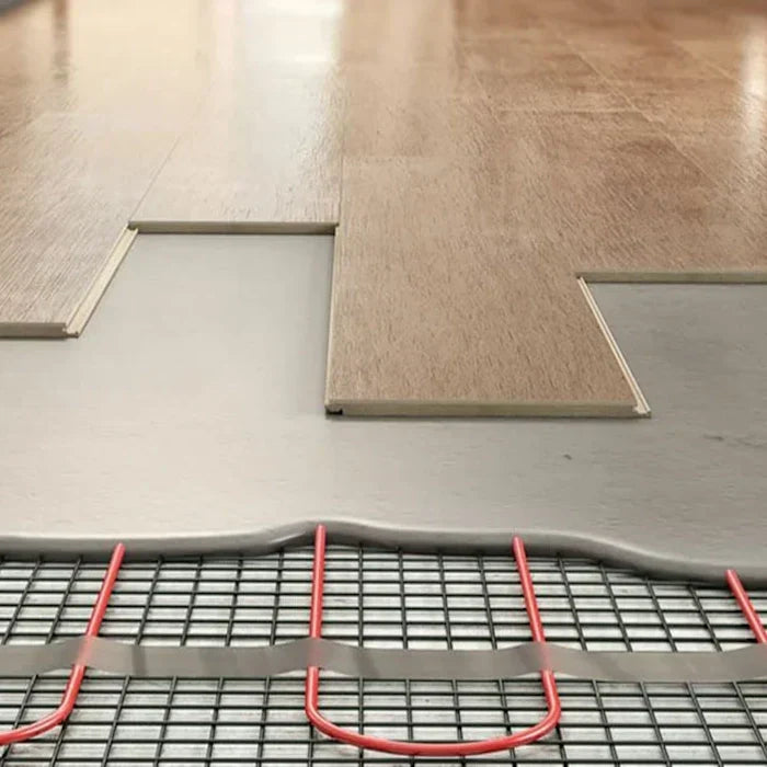 Close-up of Electric Underfloor Heating system installation beneath flooring.