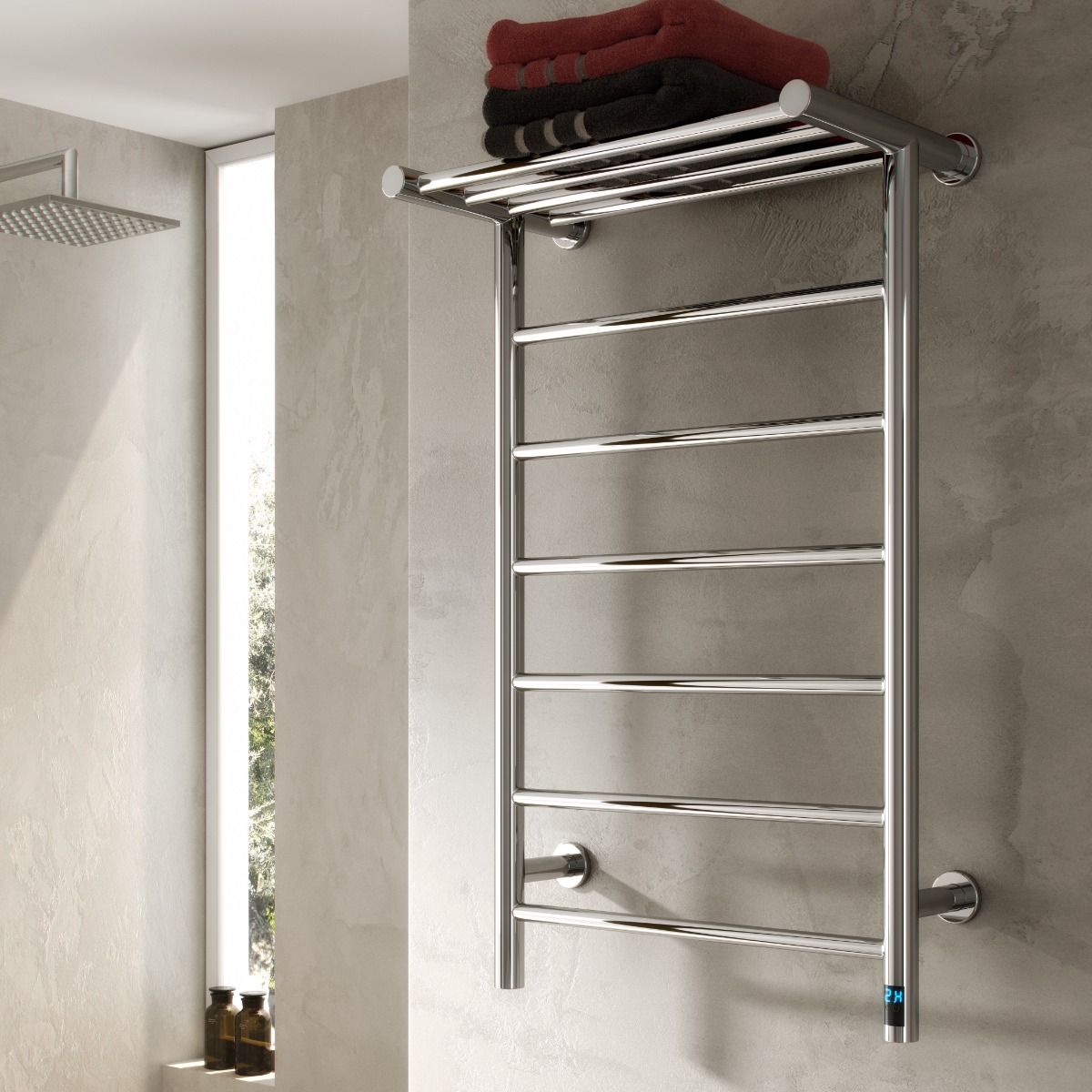 Towel Rails featuring a sleek chrome design with stacked towels in a modern bathroom setting.