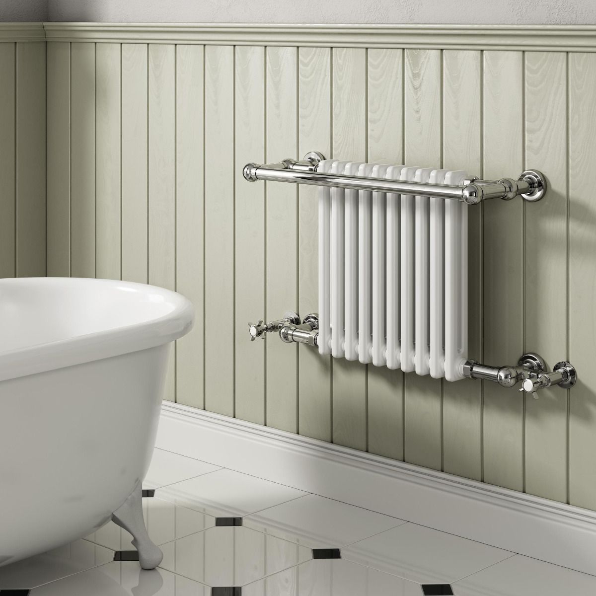 White Electric Radiators mounted on a wall beside a bathtub, adding modern style and warmth to the bathroom.