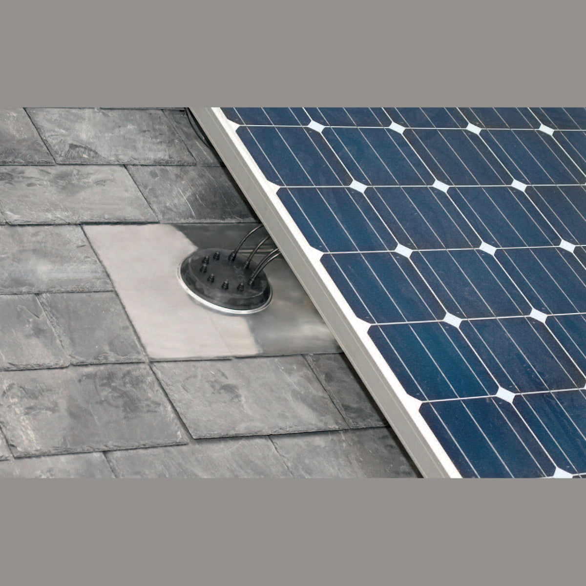 Solar panel  with dektite cable flashing on a tiled roof