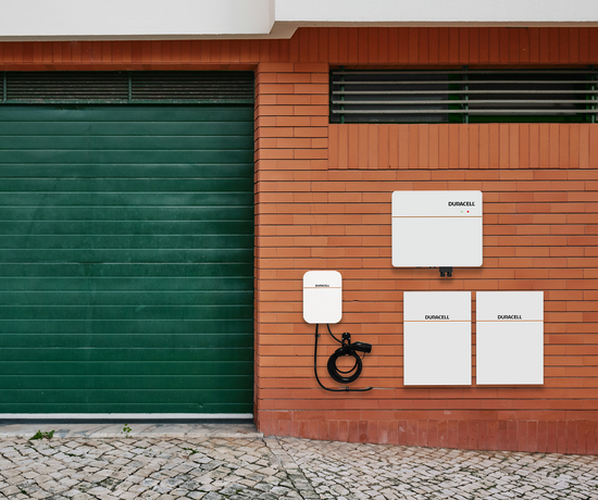 Duracell Energy Dura5 5.12kWh Outdoor Battery mounted on a wall, ideal for solar energy storage.