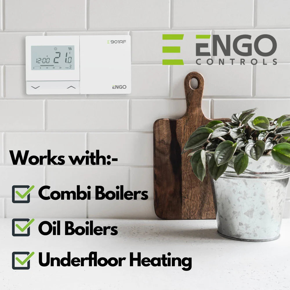 Digital thermostat on a wall with ENGO Controls branding, featuring text about compatible heating systems.