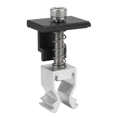 A metal and plastic spring clamp accessory with a black plastic top plate, silver metal spring, and silver aluminum clip base, shown on a plain white background.