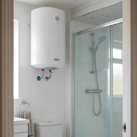 Bathroom with a Ferroli water heater, shower, and toilet.