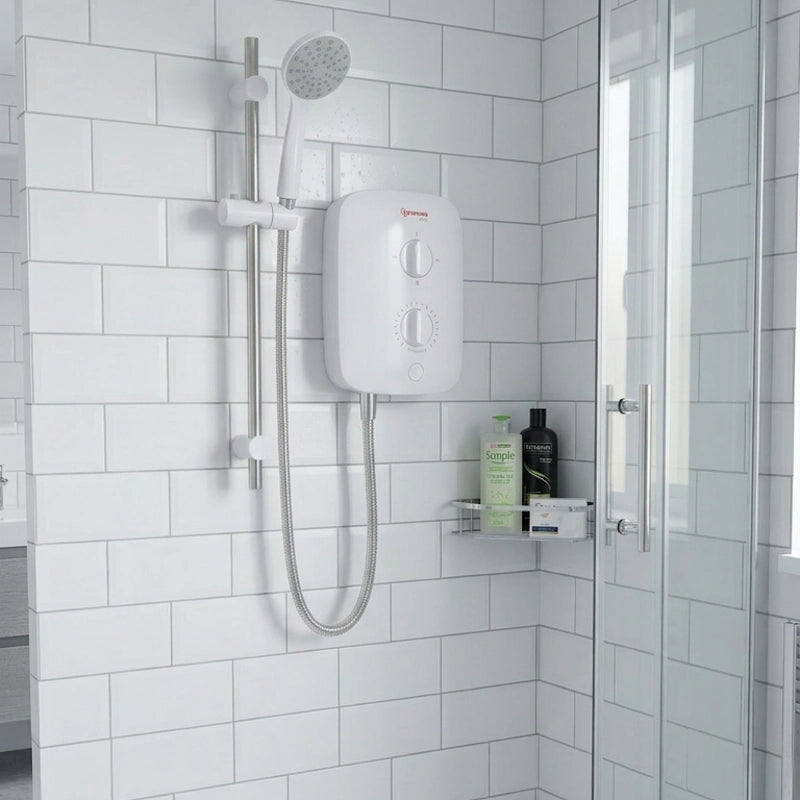 White shower head and control panel mounted on a tiled bathroom wall.