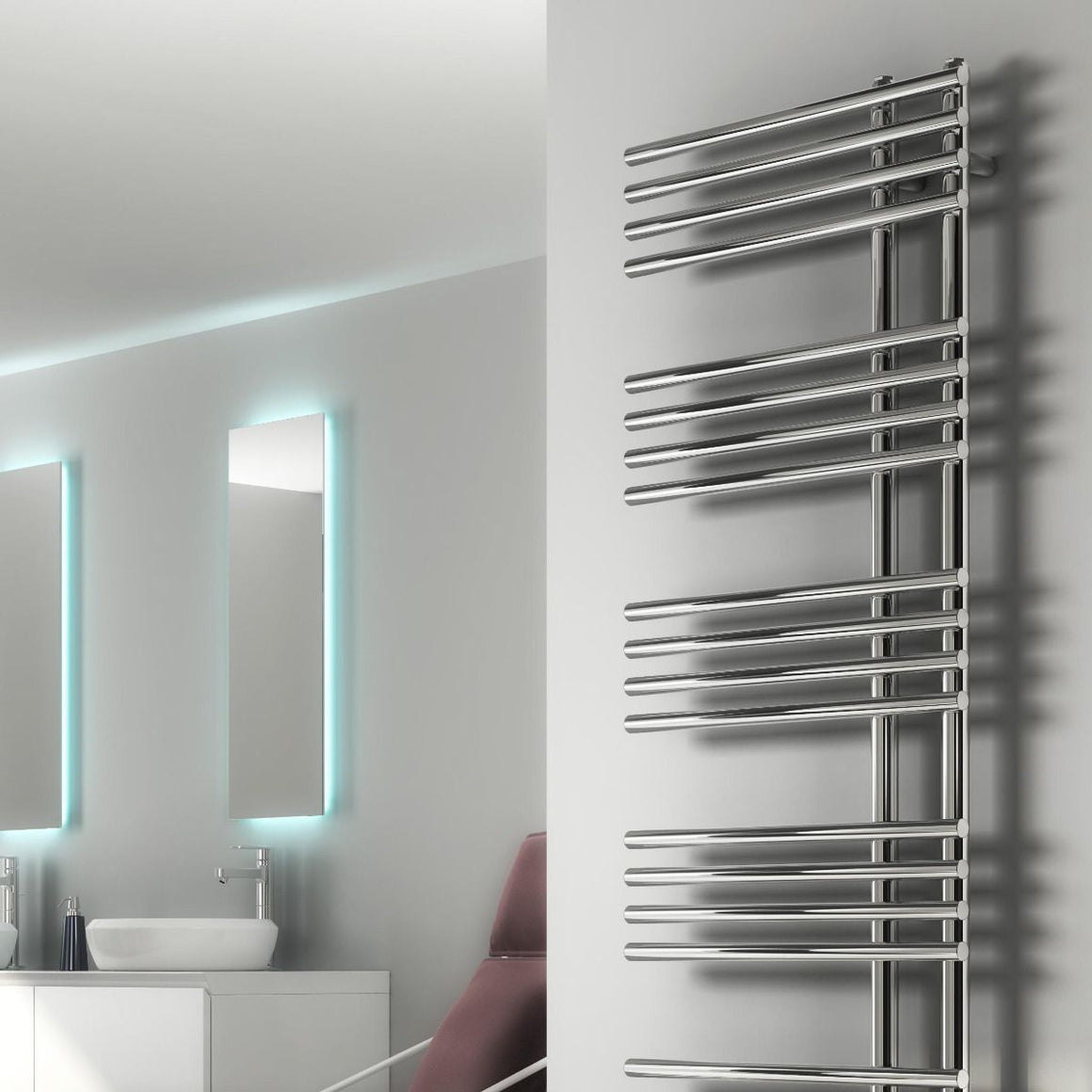 Tall metallic towel radiator mounted on a wall in a bathroom setting.