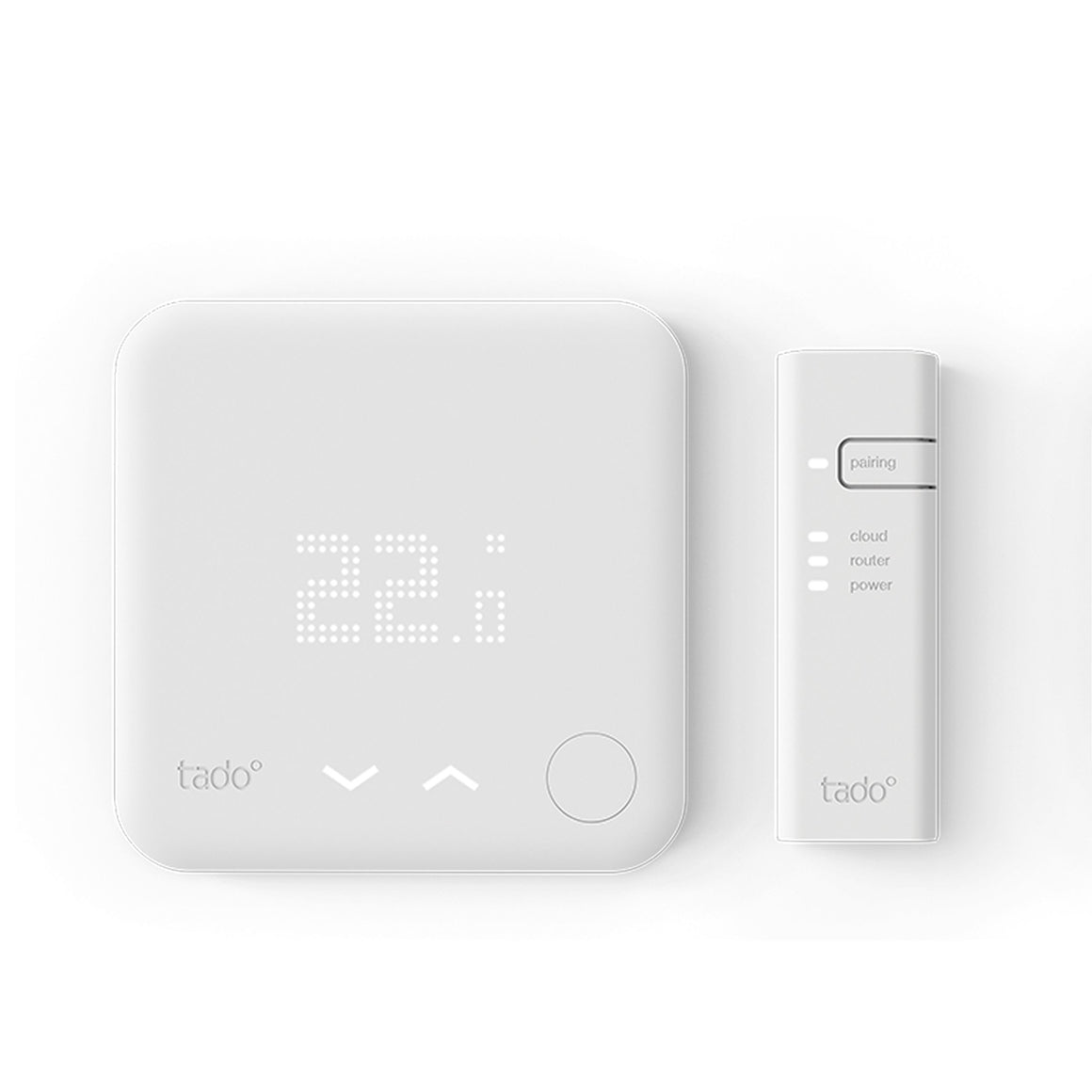 Tado smart thermostat and remote control on a white background