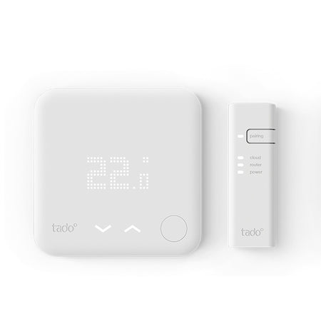 Tado smart thermostat and remote control on a white background