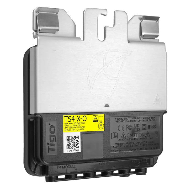 Tigo TS4-X-0 PV module rear view showing a silver metal top plate and a black plastic bottom housing with a yellow warning label.