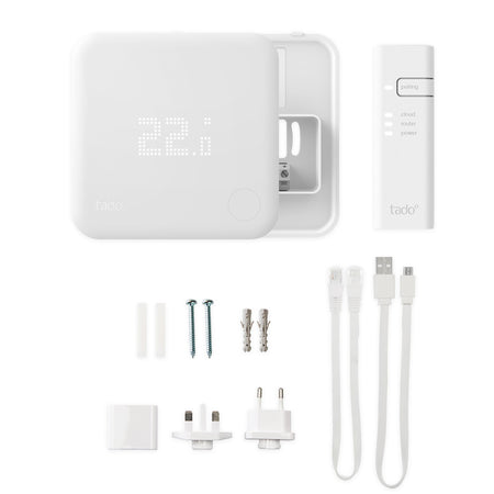 Tado smart home device kit with components on a white background